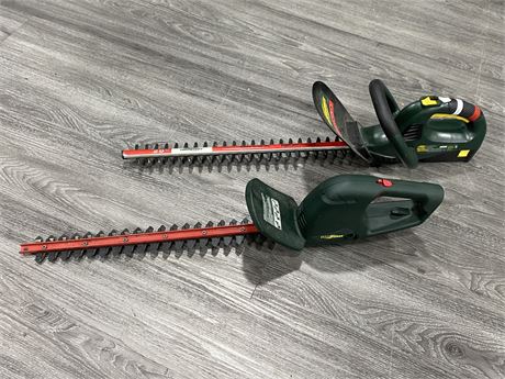2 YARDWORKS HEDGE TRIMMERS - 1 IS WORKING W/BATTERY / OTHER MISSING CORD