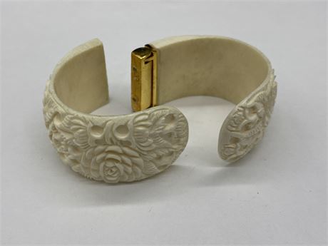 CARVED IVORY BANGLE - NEEDS REPAIR