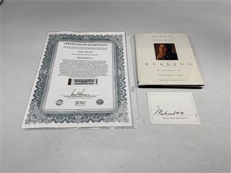 MUHAMMAD ALI BOOK ‘HEALING’ WITH COVER PLATE SIGNED BY ALI W/COA