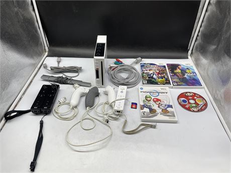 WII CONSOLE WITH CORDS, 3 CONTROLLERS & 3 GAMES (BRAWL CASE ONLY)