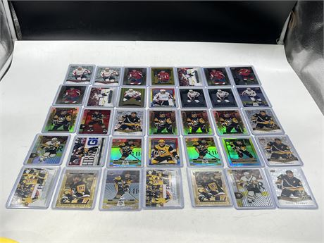 35 OVECHKIN / CROSBY CARDS IN TOP LOADERS