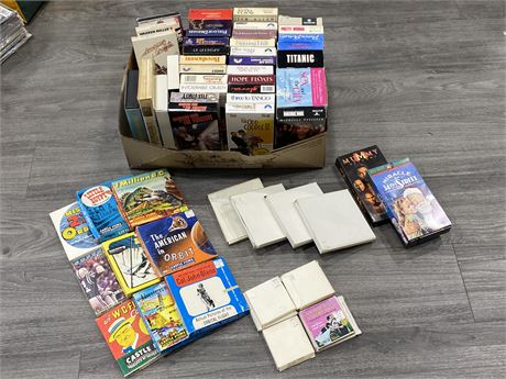 LARGE LOT OF VHS TAPES & 8MM HOME MOVIES
