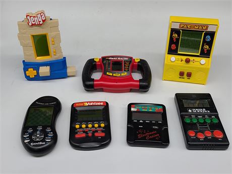 7 HAND HELD ELECTRONIC GAMES