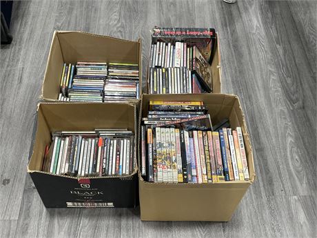 4 BOXES OF CDS / DVDS
