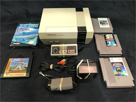 ORIGINAL NINTENDO WITH CORDS CONTROLLER AND GAMES