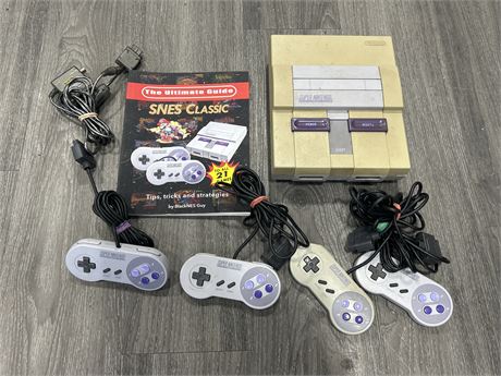 SNES LOT - SYSTEM, CORDS, GUIDE & 4 CONTROLLERS