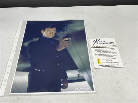 SIGNED ROGER MOORE 007 PICTURE W/COA (7”x12”)