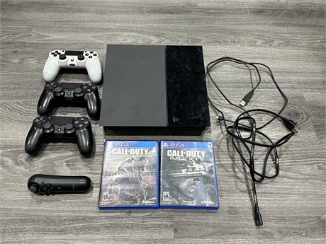 PS4 W/3 CONTROLLERS & 2 GAMES ETC.