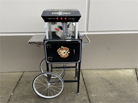 WHEELED POP CORN STAND (WHEELS ARE LOOSE/UNSURE IF MACHINE IS PART OF STAND)