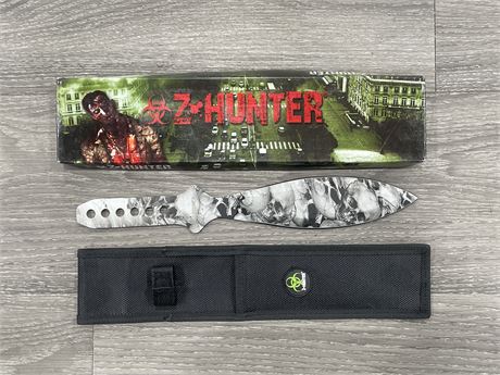 NEW LARGE ZOMBIE HUNTER SKULL PATTERN DAGGER / THROWING KNIFE W/ SHEATH - 12”