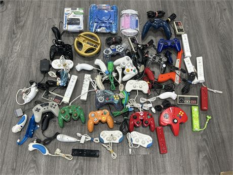 LARGE LOT OF VIDEO GAME CONTROLLERS - CONDITION VARIES
