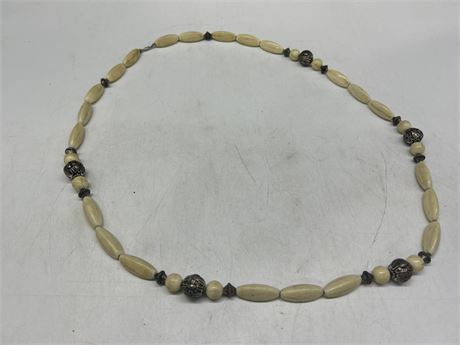 LARGE IVORY NECKLACE W/SILVER BALLS INSET