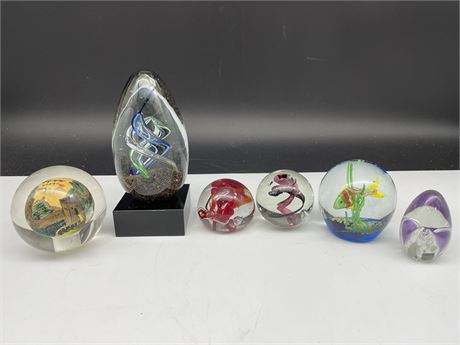6 GLASS PAPERWEIGHTS - ONE SIGNED (TALLEST IS 6.5”)