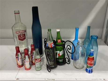 COLLECTABLE BOTTLES INCLUDING 2 FULL COLA BOTTLES, IRON BOTTLE STAND, ETC