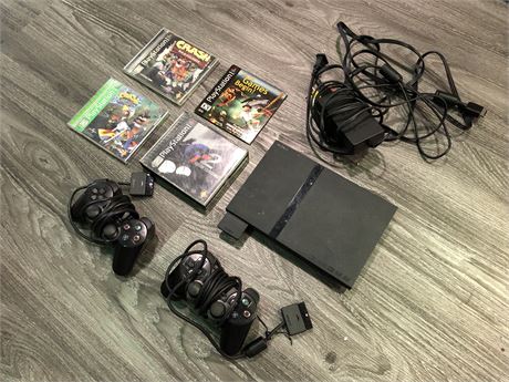 PS2 SLIM & GAMES, 2 CONTROLLERS (GAMES ARE SCRATCHED)