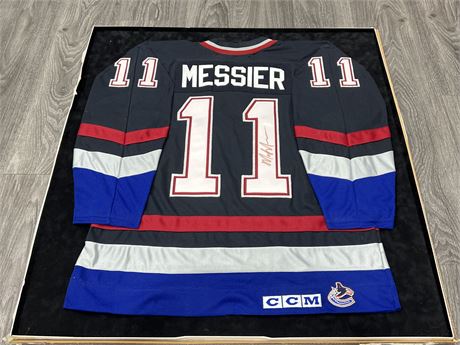 SIGNED MARK MESSIER CANUCKS JERSEY PINNED ON BOARD