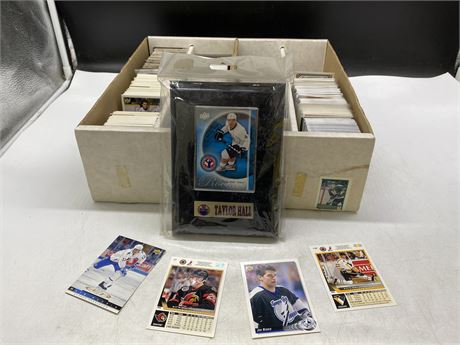 2 BOXES OF NFL CARDS & ROOKIE TAYLOR HALL PLAQUE (NO SHIPPING)