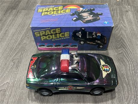 VINTAGE BATTERY OPERATED SPACE POLICE CAR W/ORIGINAL BOX 12” LONG
