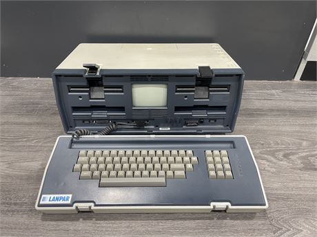 OSBOURNE MODEL OCC-1 EARLY PORTABLE COMPUTER 20”x13”