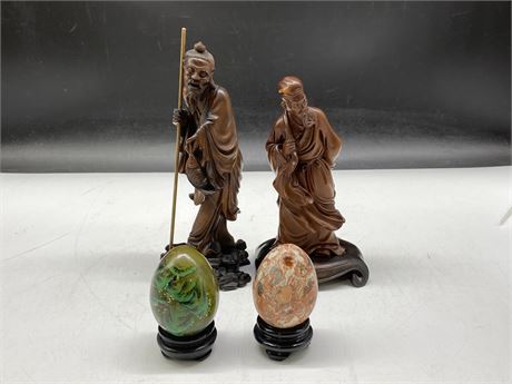 2 HAND CARVED WOOD CHINESE FIGURES, 2 STONE EGGS - 1 SIGNED (TALLEST IS 8”)