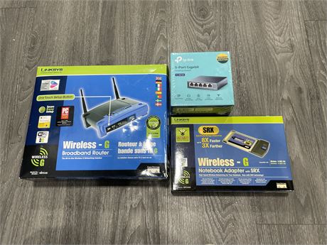 LINKSYS ROUTERS & NEW TP-LINK SWITCH