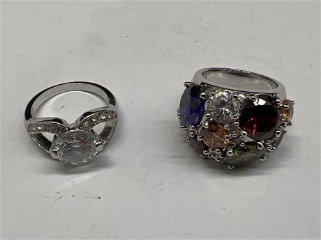 2 RINGS W/STONES STAMPED NVC - SIZE 5 & 6