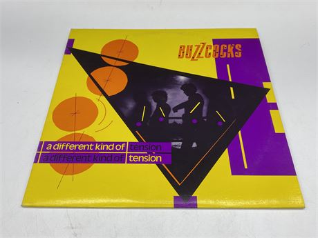 BUZZ COCKS - DIFFERENT KIND OF TENSION W/ OG SLEEVE - VG+