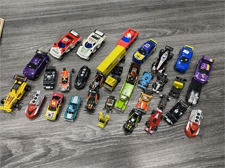 SLOT CARS/TRUCKS - AFX, TYCO, ETC. (9 Large scale in good condition)