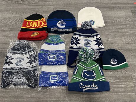 9 VANCOUVER CANUCKS TOQUES - ASSORTED SIZES - SOME BRAND NEW