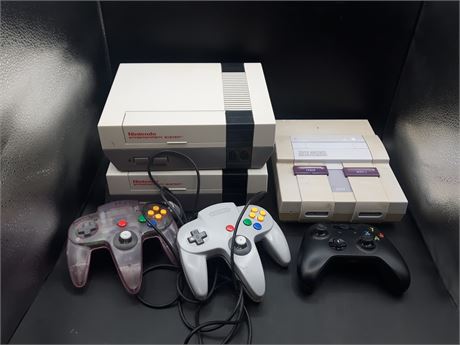COLLECTION OF BROKEN CONSOLES AND CONTROLLERS