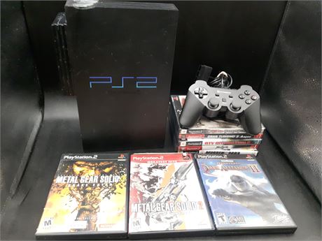 PS2 CONSOLE WITH GAMES - CONSOLE HAS BEEN TESTED AND WORKING
