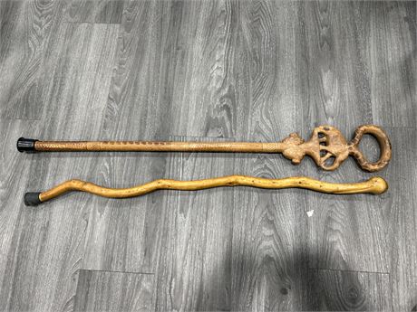 2 HAND CARVED WOODEN CANES - LONGER 27”