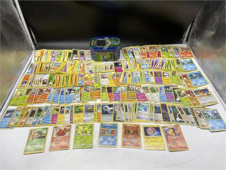 POKÉMON TIN FULL OF 300 CARDS