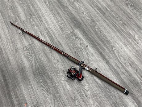 9’ DAIWA BAR ROD WITH A AS NEW SOUTH BEND COMPETITOR REEL