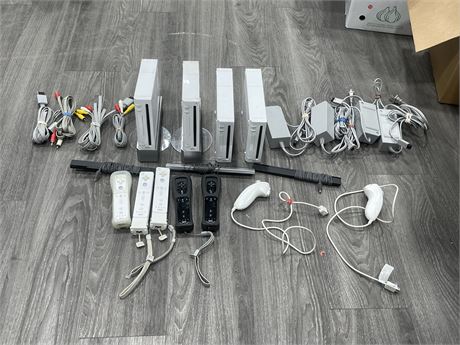 4 WII CONSOLES COMPLETE W/ CORDS & 5 CONTROLLERS (MISSING 1 MOTION SENSOR)