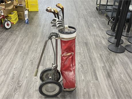 RED GOLF BAG W/DRIVERS + IRONS