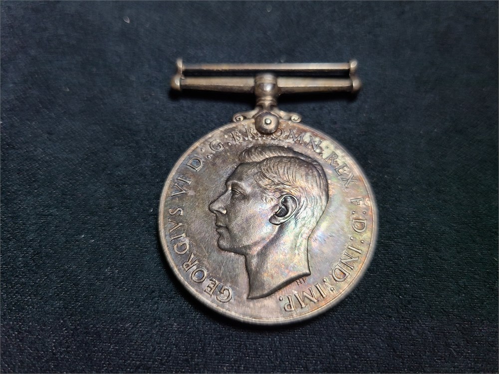 Urban Auctions - THE DEFENCE WAR MEDAL 1939-45’ (STERLING 925)