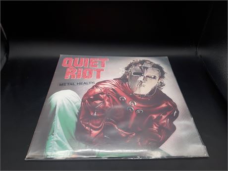 QUIOT RIOT - VERY GOOD CONDITION (SLIGHTLY SCRATCHED) - VINYL