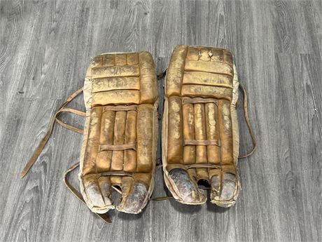 PAIR OF EARLY COOPER LEATHER GOALIE PADS 27” LONG