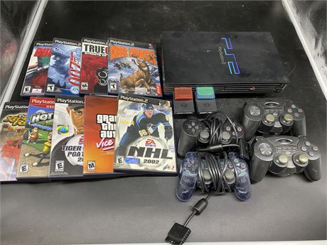 PS2 & 2 CONTROLLERS, 9 GAMES & 2 HIP GEAR CONTROLLERS (No cords for console)