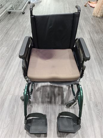 BREEZY 600 FOLDABLE WHEEL CHAIR (Used)