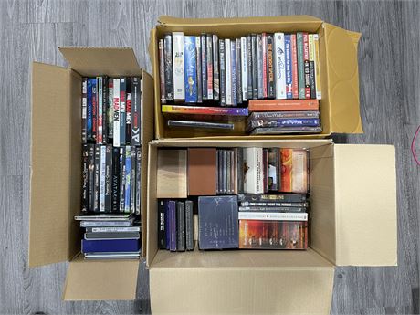 3 FULL BOXES OF DVDS/CDS/BOX SETS  - A LOT STILL SEALED