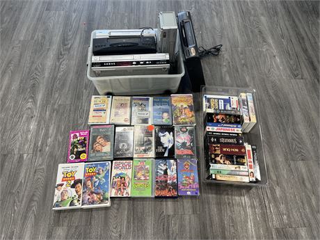 BOX OF VINTAGE VHS TAPES & VCRS