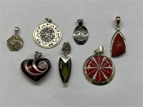 7 STERLING SILVER PENDANTS (LARGEST IS 1”)