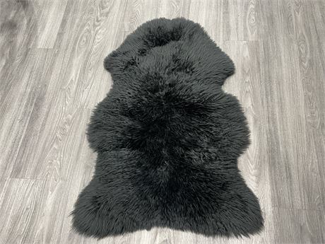 BLACK SHEEPSKIN RUG 27”x41”