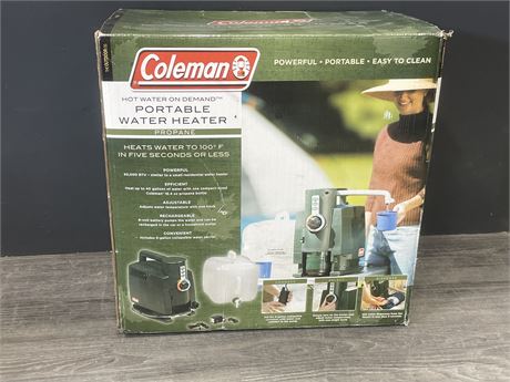 IN BOX NEVER USED COLEMAN HOT WATER ON DEMAND PORTABLE WATER HEATER