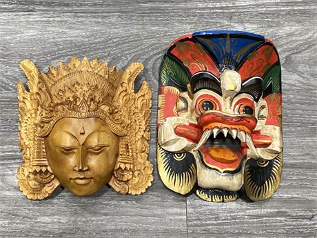 PAIR OF 2 CARVED SOUTH ASIAN VINTAGE MASKS (LARGEST IS 7”X9”)