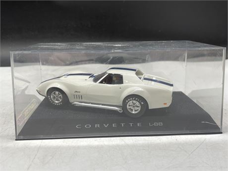 SCALE EXTRIC USA CORVETTE L-88 SLOT CAR WITH AN EXTRA CONNECTOR