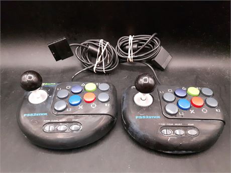 COLLECTION OF TWO PS2 TURBO JOYSTICKS