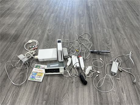 2 WII’S WITH CONTROLLERS & CORDS